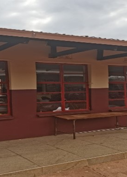 Renovated school building with red and brown paint